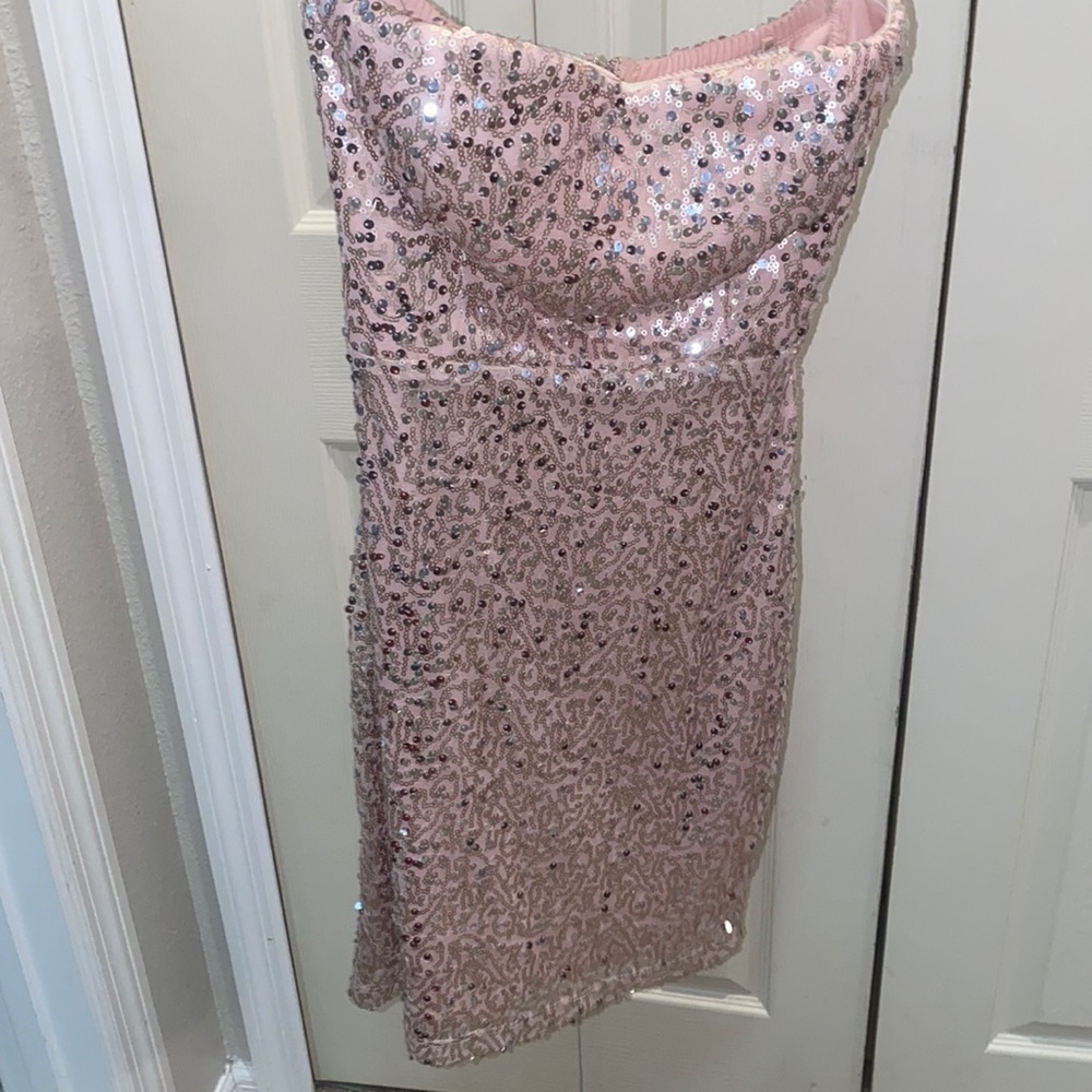 Light pink sequin dress. Runs smaller. Size medium